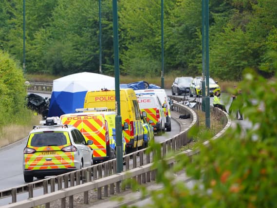 Emergency services at the scene of a crash on a dual carriageway