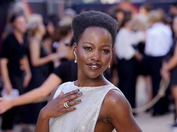 Lupita Nyong’o on the red carpet at the Odyssey world premiere