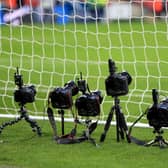 Remote cameras positioned behind the goal