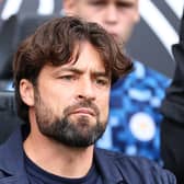 Leicester manager Russell Martin looks on