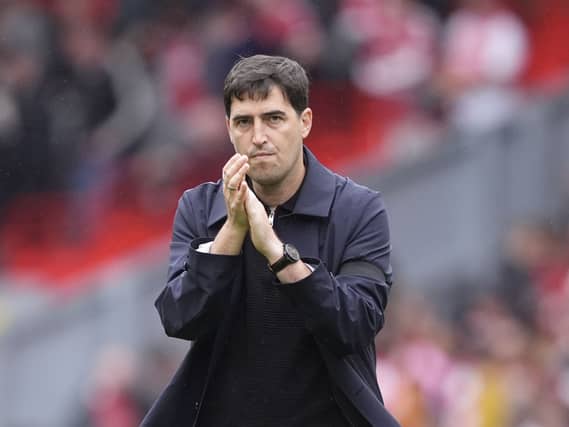 Liverpool manager Andoni Iraola applauds