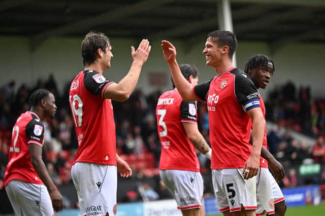 Goal scorers Aaron Pressley and Harrison Burke celebrate during Walsall's win over Accrington.