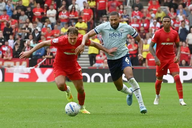 George Campbell in defence.