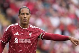 Liverpool captain Virgil van Dijk gestures on the field