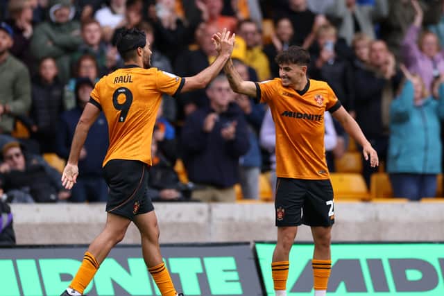 Rodrigo Gomes (right) celebrates with Raul Jimenez