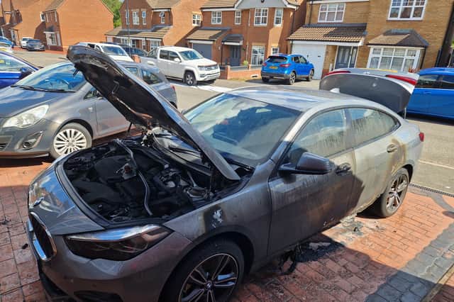 The wrecked BMW.