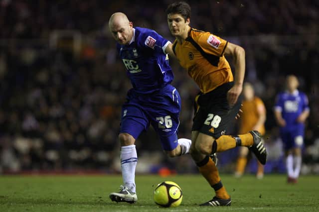 George Friend in action on a Wolves trip to Blues of many years past, up against Lee Carsley