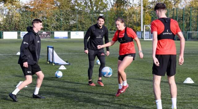 George Friend is keen to give back and say thank you for what football has given him
