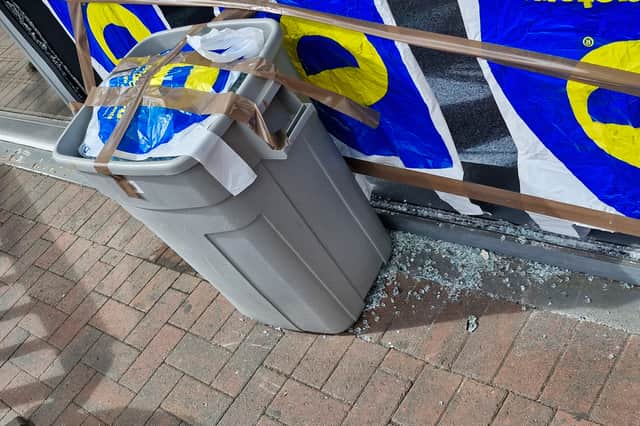 There was still evidence of the crash next to the shop