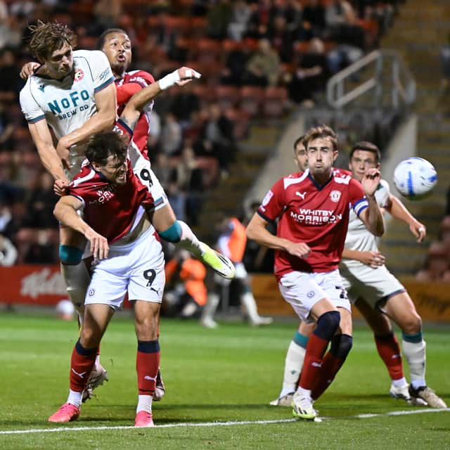 Aaron Pressley heads home his second of the game