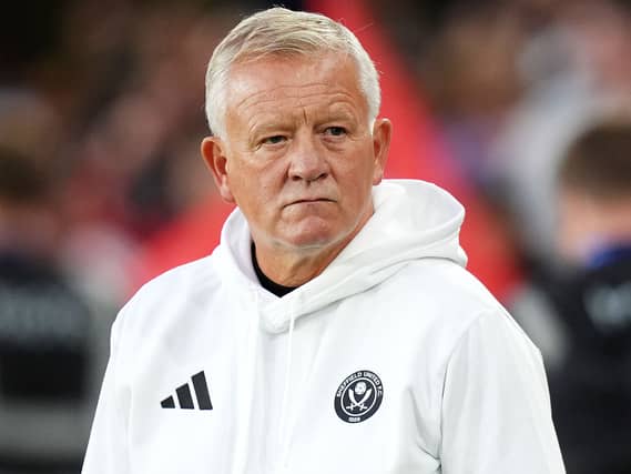 Chris Wilder looks on