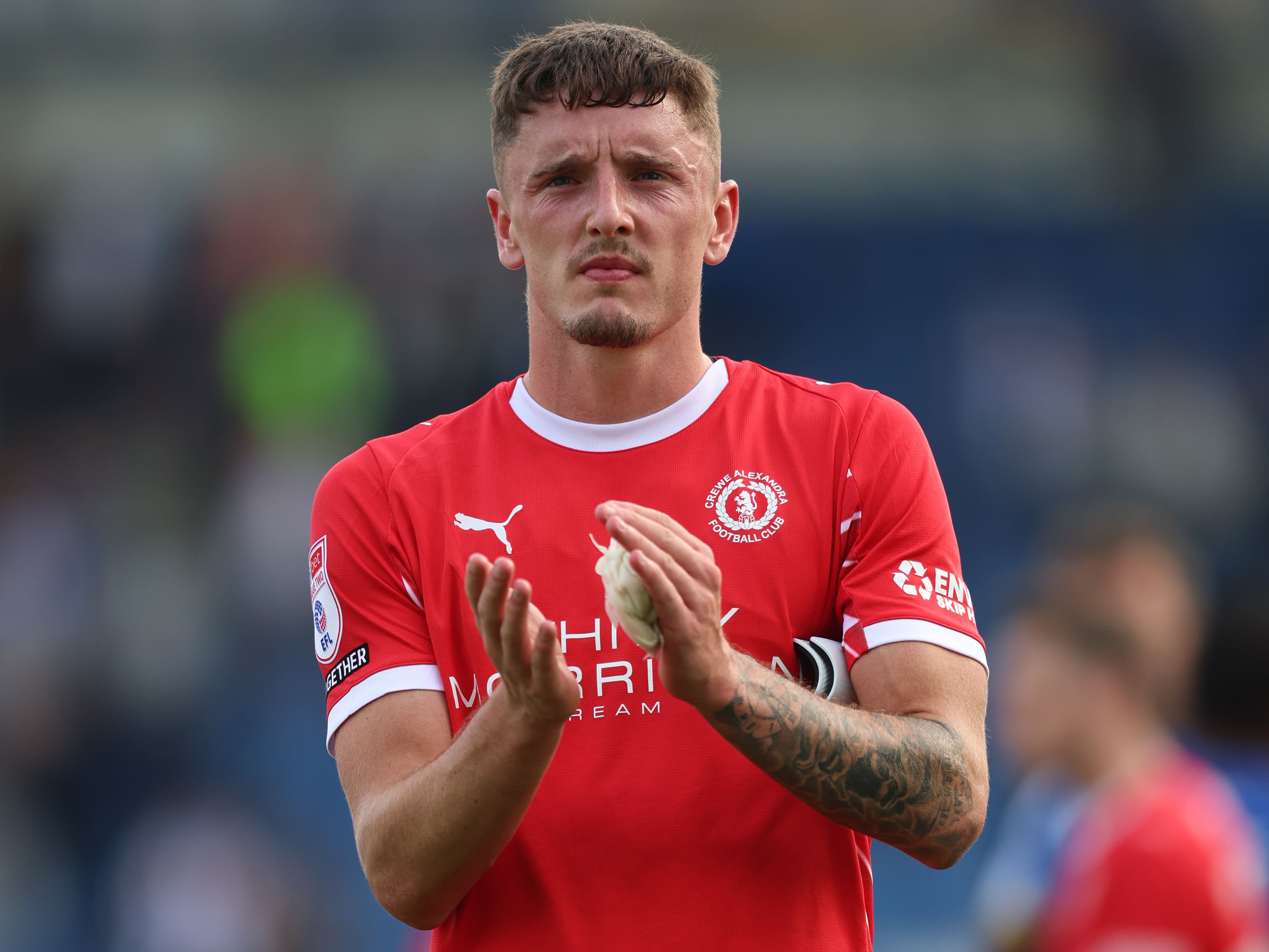 Reece Hutchinson acknowledges the Crewe fans