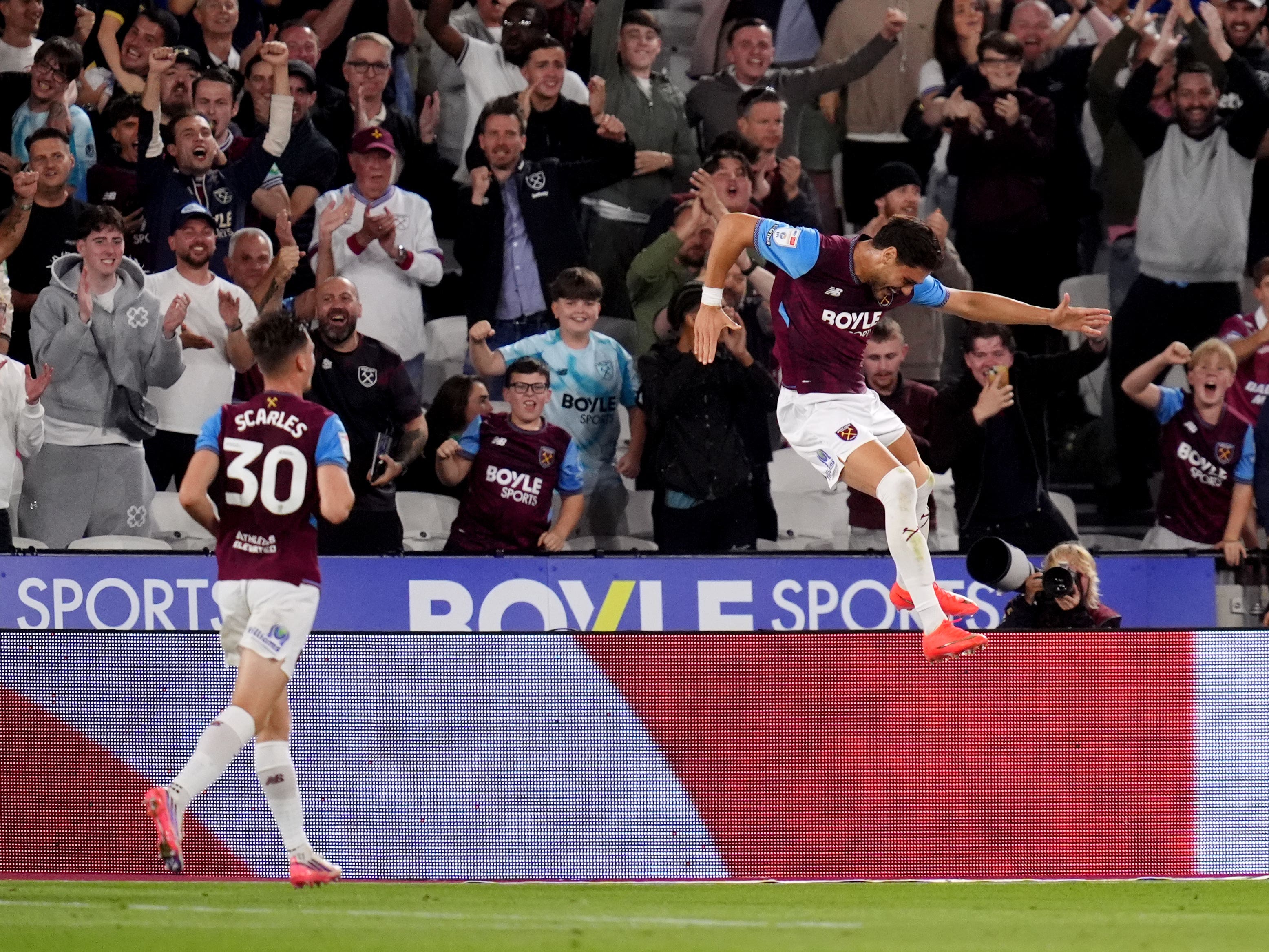 Konstantinos Mavropanos (right) celebrates