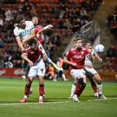 Aaron Pressley rises high to head home for Walsall