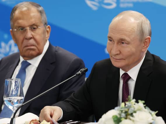 Sergei Lavrov and Vladimir Putin