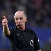 Mike Dean refereeing in the Premier League.