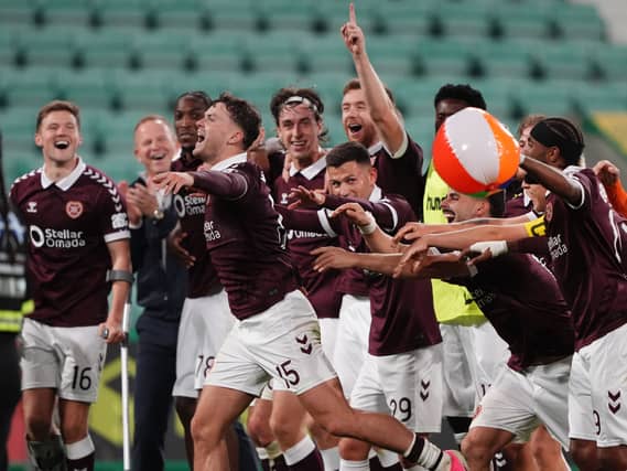 Hearts' Josh McPake celebrates with team-mates