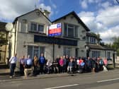Residents Outside The Labour In Vain In Yarnfield In 2023.