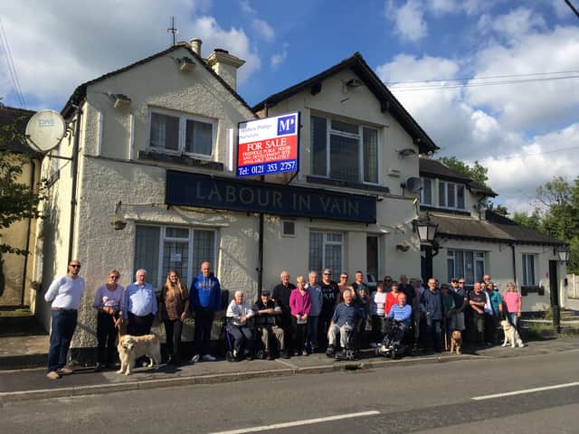 Residents Outside The Labour In Vain In Yarnfield In 2023.