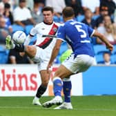 Ex-Albion defender Krystian Bielik, right, with new club Cardiff City.