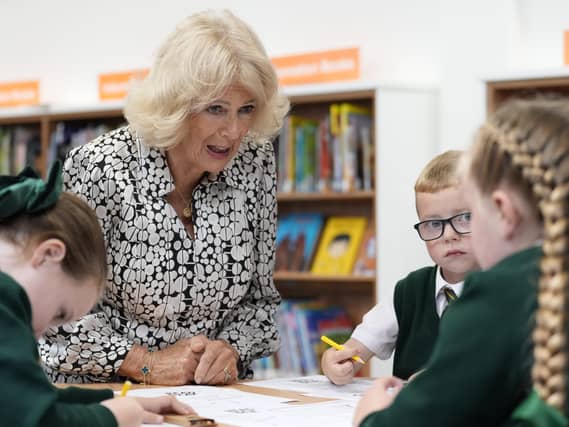The Queen talks to local schoolchildren