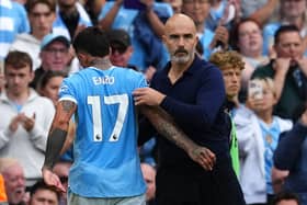 Manchester City midfielder Enzo Fernandez with manager Enzo Maresca