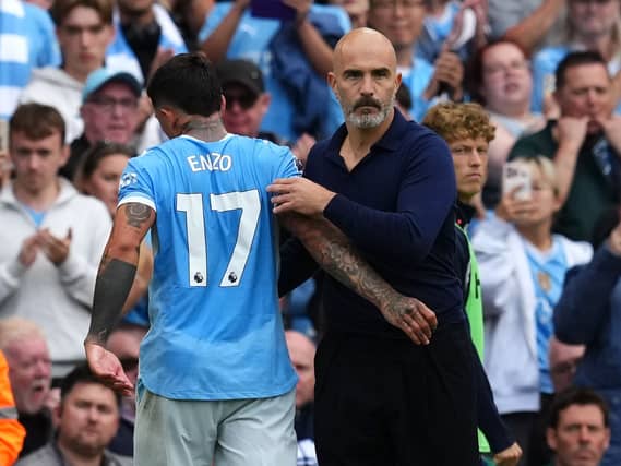 Manchester City midfielder Enzo Fernandez with manager Enzo Maresca
