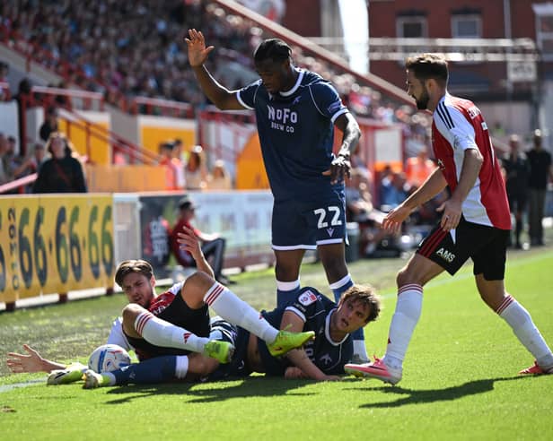 Action from Walsall's hard-fought goalless draw at Exeter City