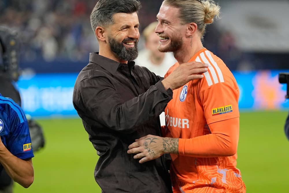 Schalke’s head coach Miron Muslic and goalkeeper Loris Karius celebrate their draw with Bayern Munich