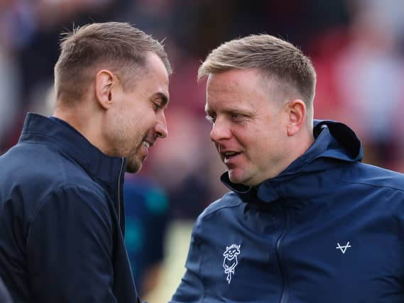 Tonda Eckert greets Lincoln City joint manager Tom Shaw