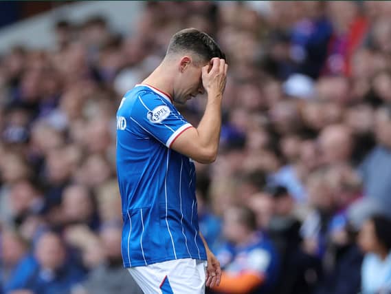 Lawrence Shankland leaves the pitch injured