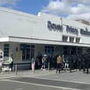 Men dressed in black outside Dover Priory Station