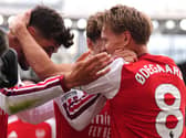 Martin Odegaard celebrates scoring the winning goal with Kai Havertz