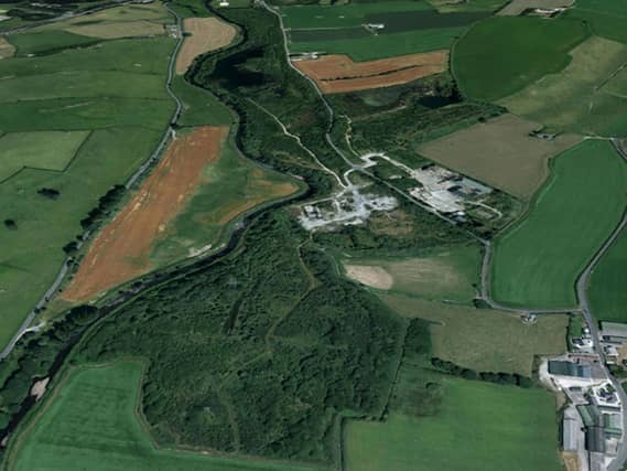 Aerial view of Mobuoy dumping site contamination