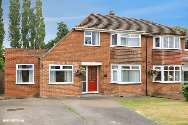 A manicured front lawn and generous driveway give this Wolverhampton home an appealing arrival