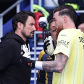 Cesar Peixoto and Jose Sa deep in discussion