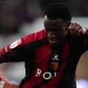 Watford's Mamadou Doumbia battles for the ball