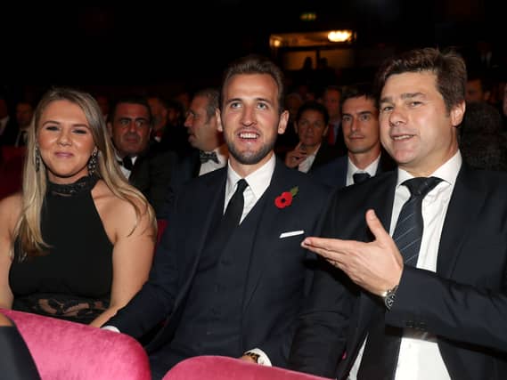 Harry Kane and Mauricio Pochettino at an awards ceremony