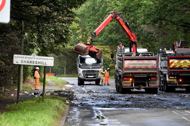 Clean-up crews at the scene of the lorry fire on the A460 at Shareshill