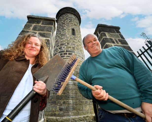 Jayne Pilkington and Jim Galloway get Sedgley Beacon looking good ahead of the Heritage Open Days event.