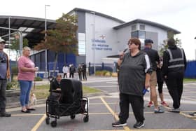 Protesters outside an RNLI base