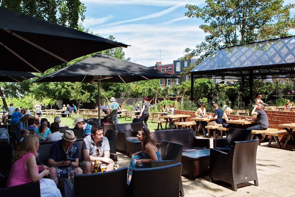 People sitting in a pub garden