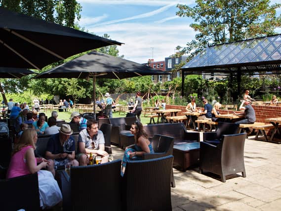 People sitting in a pub garden