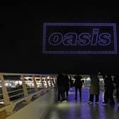 A drone light show over the Joie Stadium football ground at the Etihad Campus in Manchester