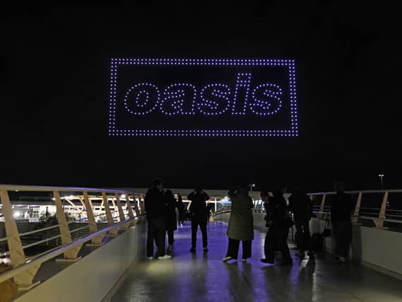 A drone light show over the Joie Stadium football ground at the Etihad Campus in Manchester
