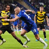 Neo Eccleston, left, in action for Barrow against Chelsea