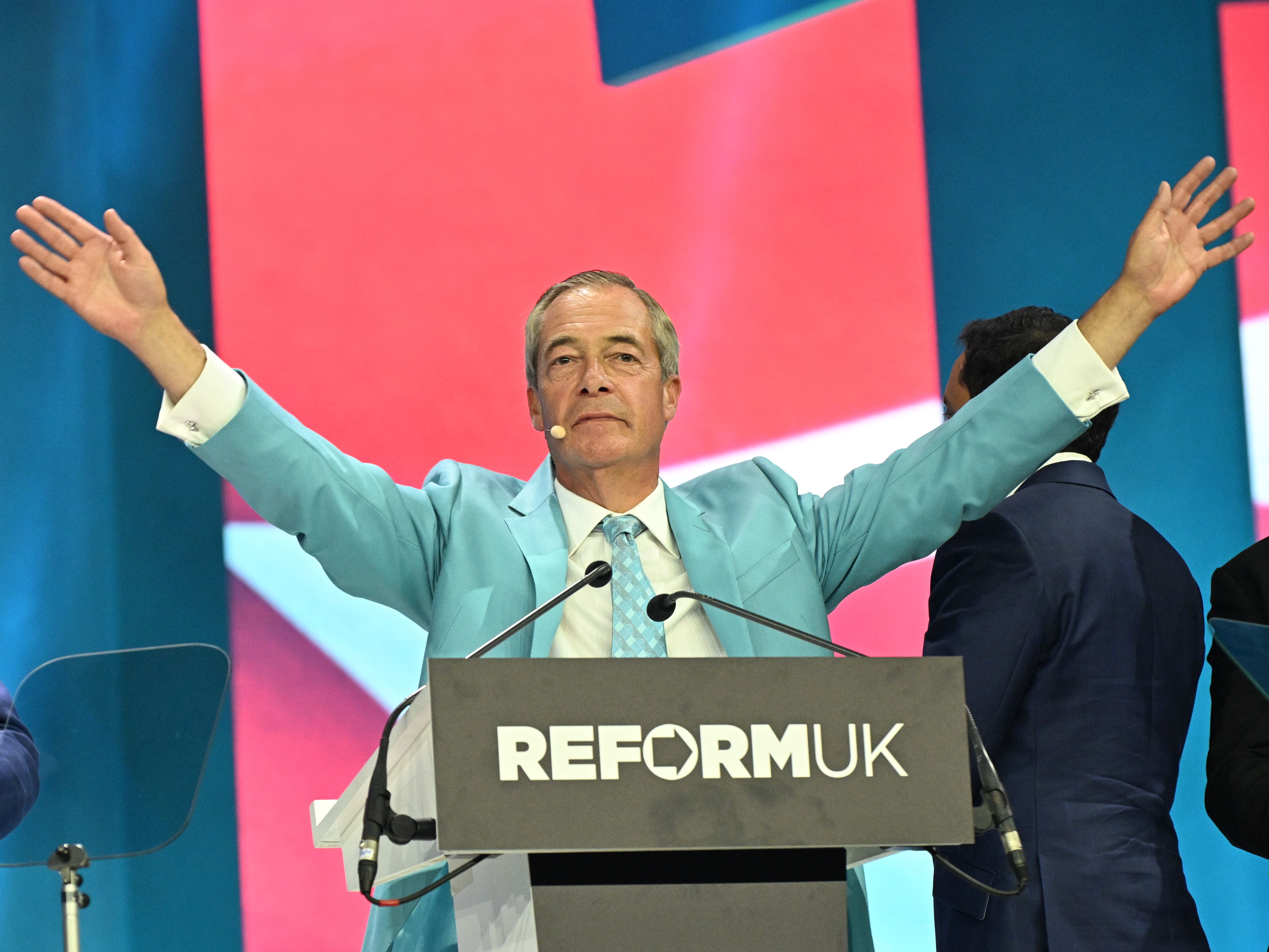 Reform UK leader Nigel Farage speaks during the party's national conference at the National Exhibition Centre in Birmingham