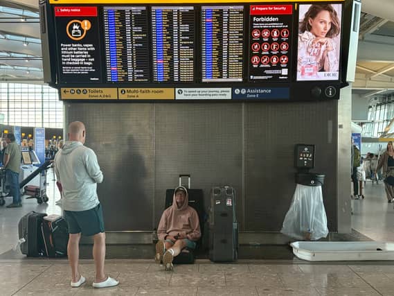 Passengers at Heathrow Airport in west London during disruption after a system issue hit air traffic provider Nats