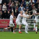 Zan Vipotnik celebrates with team-mates