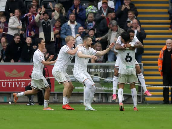 Zan Vipotnik celebrates with team-mates